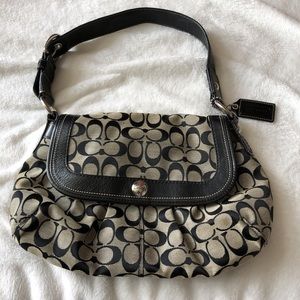 Black coach handbag.